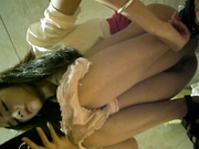 KTV夜场厕所偷拍.极品长腿女神,包臀齐B裙,看着手机傻笑